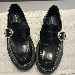 Black Patton, leather loafers with the silver buckle size 7